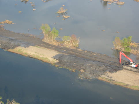 TFG swamp buggy making  levees repairs.jpg
